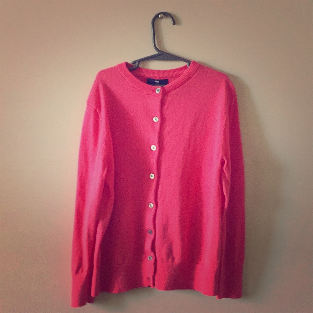 A pink Gap cardigan
